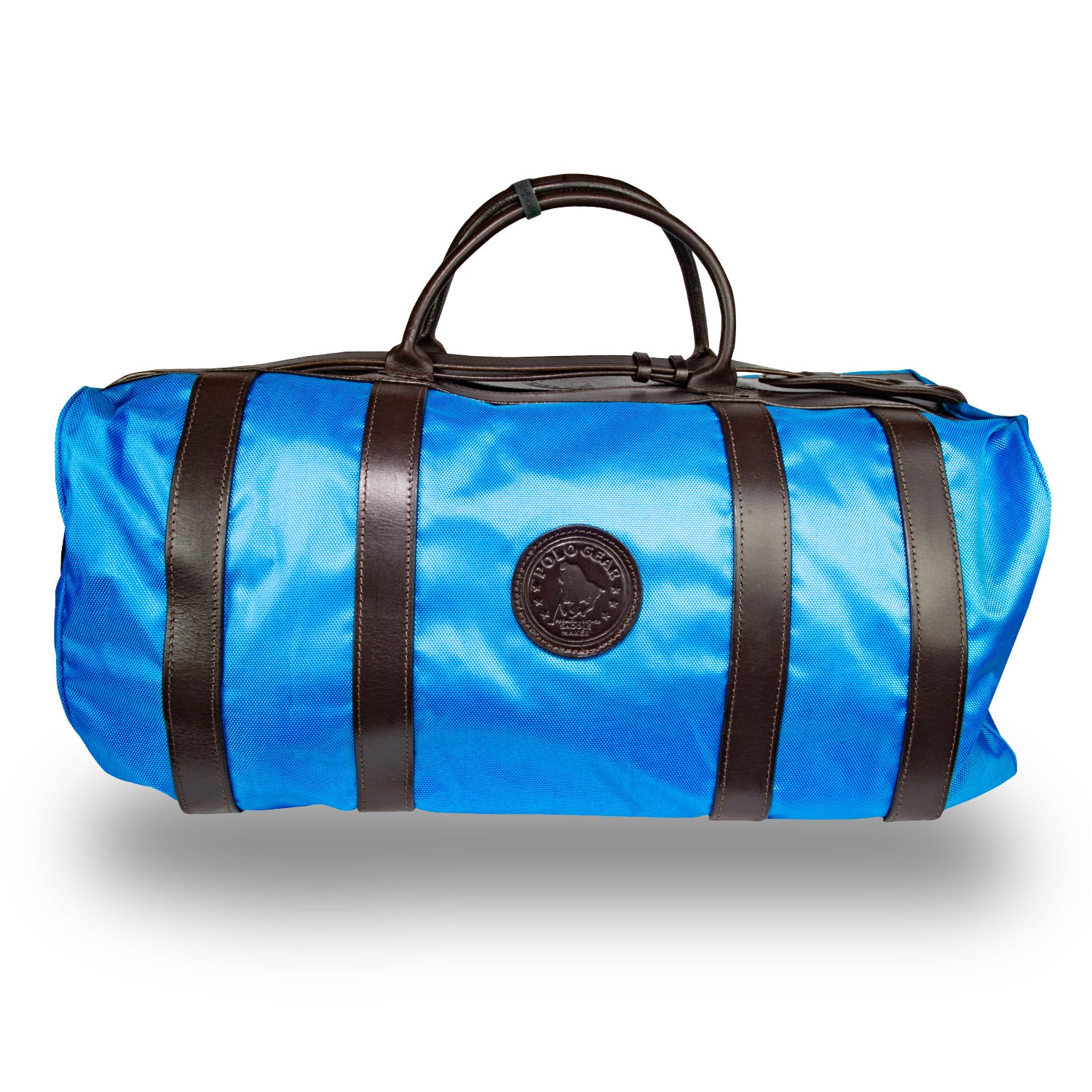 A Royal blue polo team bag with leather accents and the embossed Polo Gear logo, designed for carrying equipment and gear on the polo field.