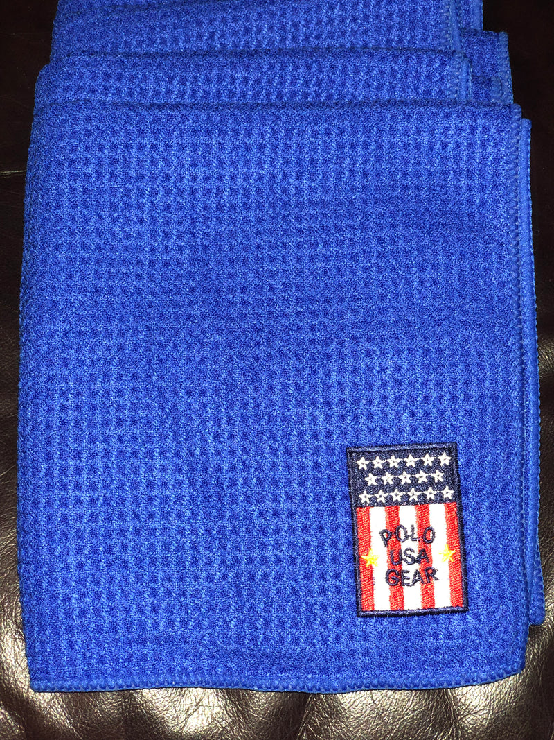 Blue hand towel embroidered with the PoloGear USA logo.