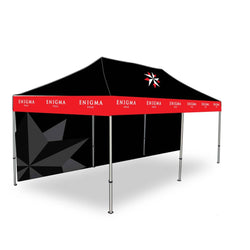 Black and red tent with a black back wall and open front.