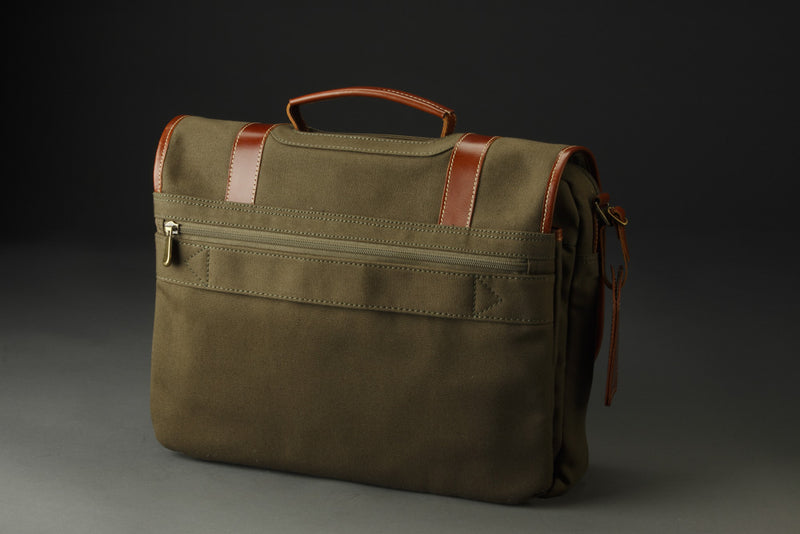 Made of canvas, the Sheridan Briefcase is beautifully durable and reliable. Leather features make it an attractive travel companion. The back zipper pocket is the width of the briefcase, making it a great spot to hold important papers that you need to reach easily.