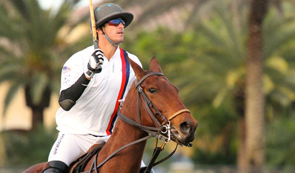 Polo Player with white shirt on horse